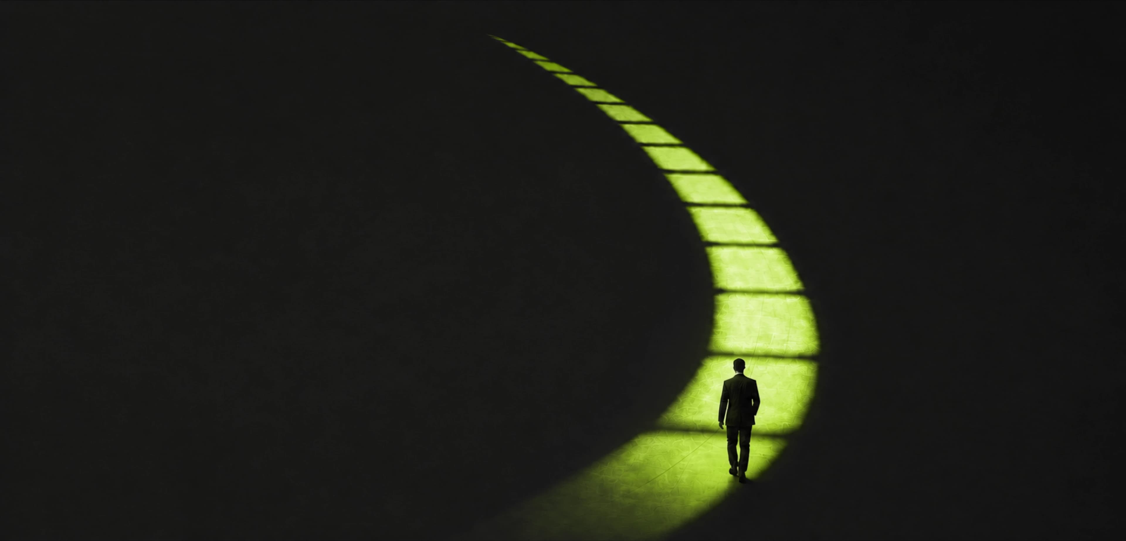 A person walking along a bright path